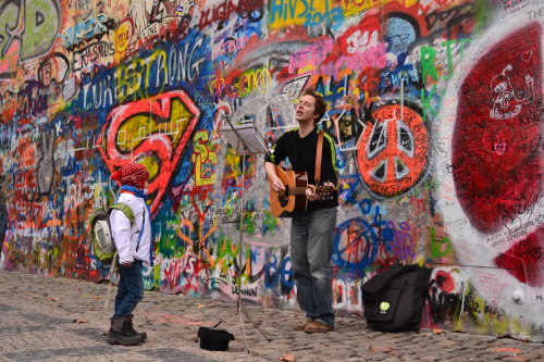 A busker &amp; a fanJohn Lennon Wall, PragueCzech Republic