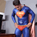 hotudla:“Whenever you hear the word ‘SuperCockSucker’ all your powers will fade away”. 🍆💪🏻💥Evil Michael Delray is in his office plotting evil stuff. He has a huge rock hard boner, bulging through his red spandex pants. Superman (Dante