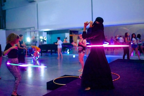 sadology:sinnerman00:A saudi girl hooping while wearing Niqab and abayaHer name is Balqis Alrashed. 