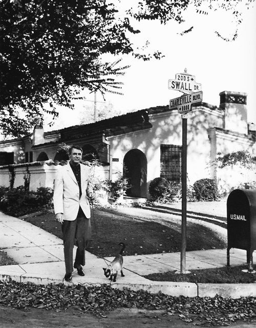Cary Grant walking his cat