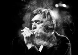 gorgonetta:  [Blixa Bargeld on stage in a cloud of cigarette smoke.] 