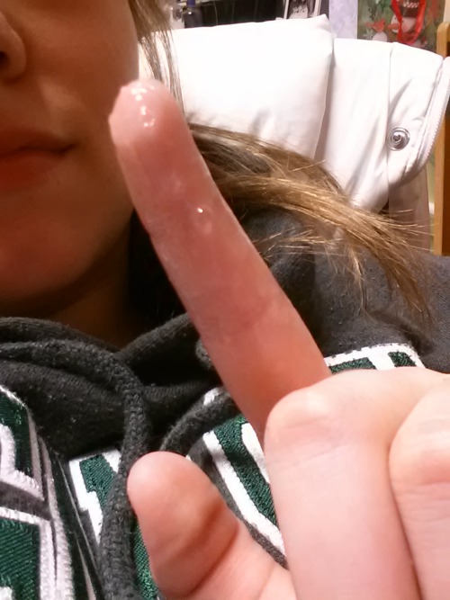 adaddysgirl:  Daddy gave me permission to cum, under the condition that I use two fingers in my ass. This is the result of two fingers in my ass, one in my pussy, and a vibrator on my clit: one very wet finger.  Nice sweatshirt.  Nice finger.