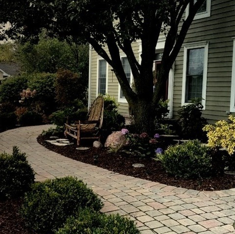 Driveway ChicagoThis Is An Illustration Of A Sizable, Conventional Front Yard Brick Landscaping In The