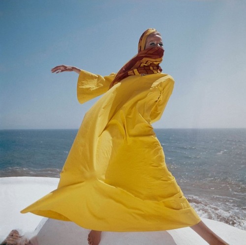 serafino-finasero:Veruschka in a yellow caftan and a red and yellow head scarf | photographed in San