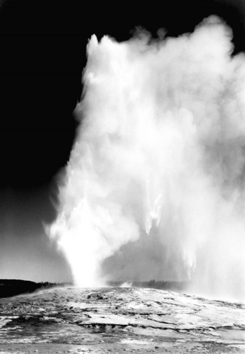 Old Faithful at low lightIn 1941, nature photographer Ansel Adams traveled through a number of natio