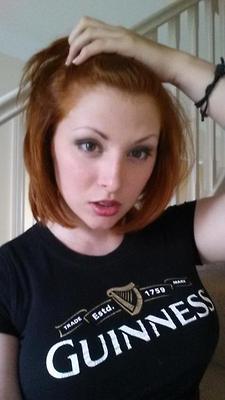 sexyredheadsnsfw:  She enjoys a good beer