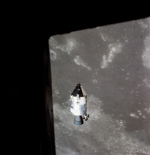 A view of the Apollo 15 Command and Service Modules in lunar orbit as photographed from the Lunar Mo