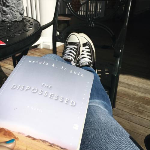 literaryestella:#currentlyreading #thedispossessed #conversegirl #converse #chucks