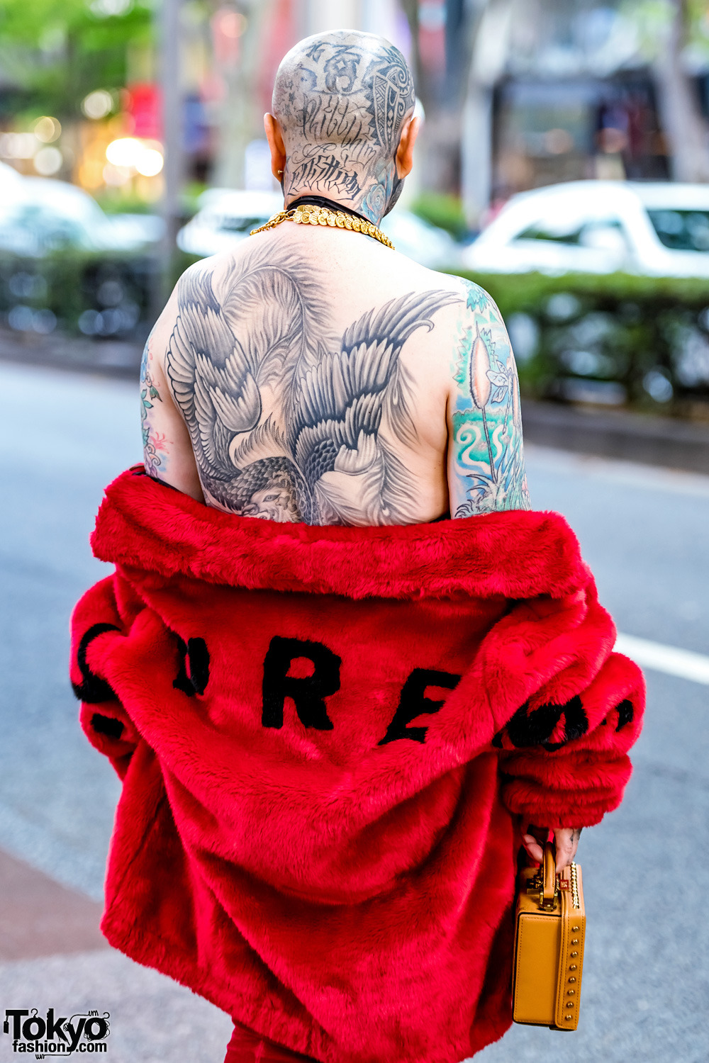 tokyo-fashion:Fashion boutique owner Amy on the street in Harajuku wearing a red