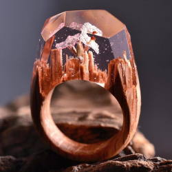 incredifishface:  amandahuffleduck:  spinelsoul:  marilythscales:  sylveon-against-sjws:  culturenlifestyle:  Miniature Magical Worlds Encased In Wooden Rings Secret Wood is creative Canadian online shop which specializes in handcrafted unique jewelry-