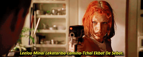 Leeloo speaks gibberish while pointing a gun 