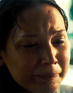 solo-por-un-dia:  peetamellarkthebaker: I leave my weapons in the dirt as I fling myself at him. “Peeta?” I say softly. I brush the damp blond strands of hair back from his forehead, find the pulse drumming against my fingers at his neck.  His lashes