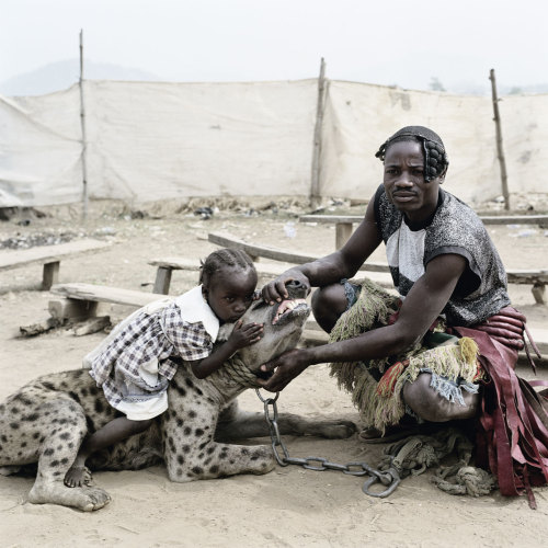 titytwochainz:  hip-hop-quest:  liftedandgiftedd:  keepbangin:  cenobiteme:  Nigeria’s Hyena Men by photographer Pieter Hugo   thats dope  this is raw as fuckk  real thugs  fuck yo pit bull 
