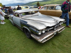 fromcruise-instoconcours:Junkyard special of a hot rod, with a matching El Camino-esque trailer, and custom bike to boot.