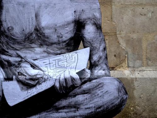 itsderandom:The French street artist known as Levalet, aka Charles Leval, works in Paris filling con