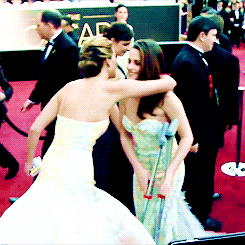 jenniferlawrencedaily:  Jennifer Lawrence greeting Kristen Stewart at the Oscars.   Still shipping…