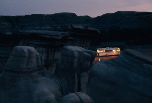 natgeofound:  A mobile home shines amid eerie rock formations in Alberta, Canada, October 1970.Photograph by W.E. Garrett, National Geographic