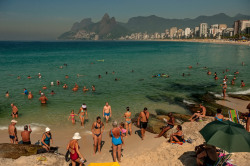 africansouljah:  David Alan HarveyBRAZIL. Rio de Janeiro, RJ. 2010. Beach scene at Ipanema Beach.