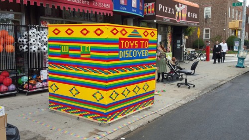 happiness-in-yiddish: Amazing sukkah made out of Lego in boro park in front of a toy store.