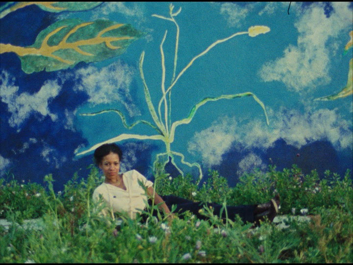 fuckyeahwomenfilmdirectors: Painter Susan Jackson in front of her artwork in Mur