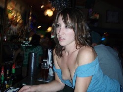 secretlaurie:   Your wife loves going to the bar by herself.  She never wears a bra, she doesn’t need one for her tiny little titties.  She seems to enjoy wearing those cute little tops that accidentally expose her tits!  I bet she’s a popular