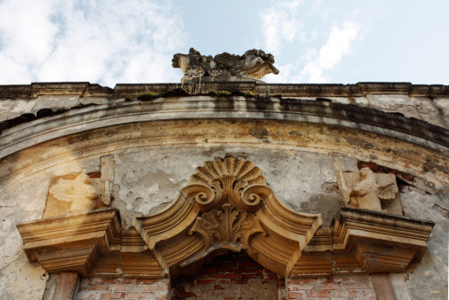 Stables with Baroque ornaments and a representation of Helios in the upper register. Bánffy castle i