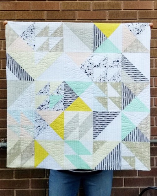 “Embrace the Chaos” baby quilt: I finished up the baby quilt that I started at a workshop in April w