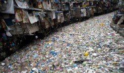 coolthingoftheday:  The Citarum River in West Java, Indonesia is widely considered to be the most polluted river on Earth. The people who live there drop all of their trash into the river, and more than 2,000 different industries illegally dump toxic