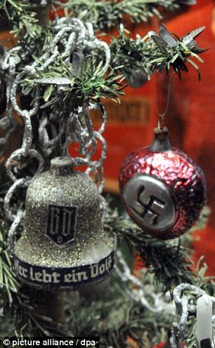 Nazi Christmas tree decorations used during the Third Reich, depicting swastikas, the party salute &