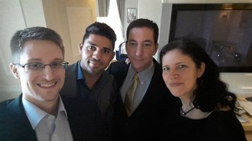 Of course, the first photo of Edward Snowden and Glenn Greenwald together is a selfie.