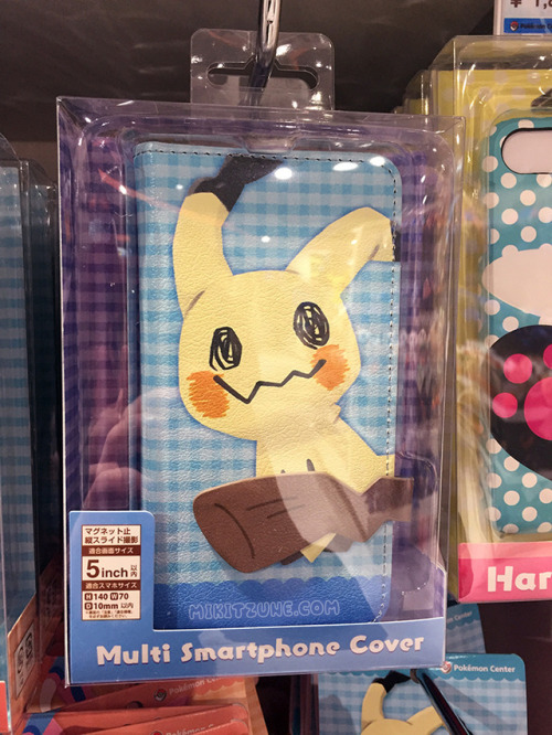 Flip phone cases featuring Charmander, Mimikyu, Sylveon, and Pikachu from the Pokemon Center Tails &