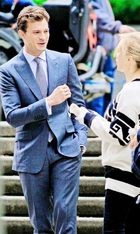 fiftyshadesofgreyinspiration:    Jamie Dornan and Sam Taylor Johnson -  Fifty Shades of Grey reshoots  source:jamie-dornan.org   I love his smile, my smail.