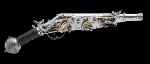 A rare two shot (superimposed load) wheel-lock pistol dated to 1609.  Crafted by Valentin Klett of S