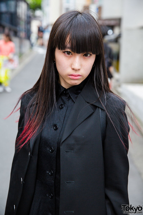 19-year-old Ayaca on the street in Harajuku with dip dye hair, a Yohji Yamamoto coat, and resale lac