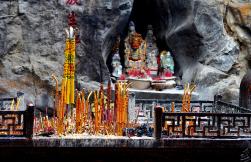 A Buddhist shrine was found in a small alcove in the rocks, located within Elephant Trunk Hill Park,