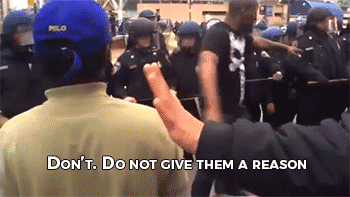colerfuldarkness666:  sizvideos:  Protester in Baltimore trying to avoid violenceVideo  hey CNN why didn’t you show this clip?