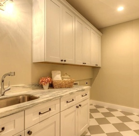 Laundry In PhoenixUtility Room - Mid-sized Traditional Galley Marble Floor Utility Room Idea With An