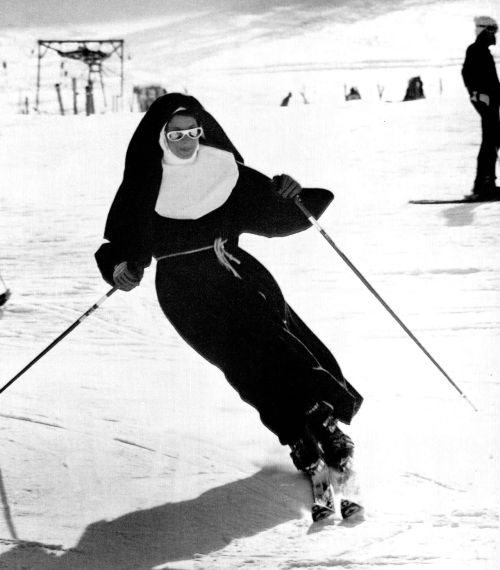 Sister Carolina, a Roman Catholic nun, enjoys a sunny day skiing with perfect style on the snow at M