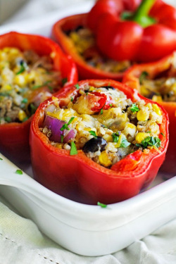 omg-yumtastic:  (Via: hoardingrecipes.tumblr.com) Cheesy Quinoa and Veggie Stuffed Bell Peppers - Get this recipe and more http://bit.do/dGsN  Ooh gimme