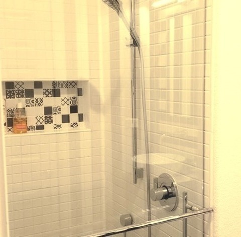 3/4 Bath BathroomExample Of A Mid-sized 1960s 3/4 White Tile And Mosaic Tile Mosaic Tile Floor And Black