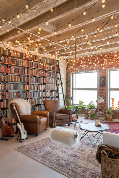 geographically-challenged:  Books, comfy chairs, guitars and a swing…what more do you need? 😀