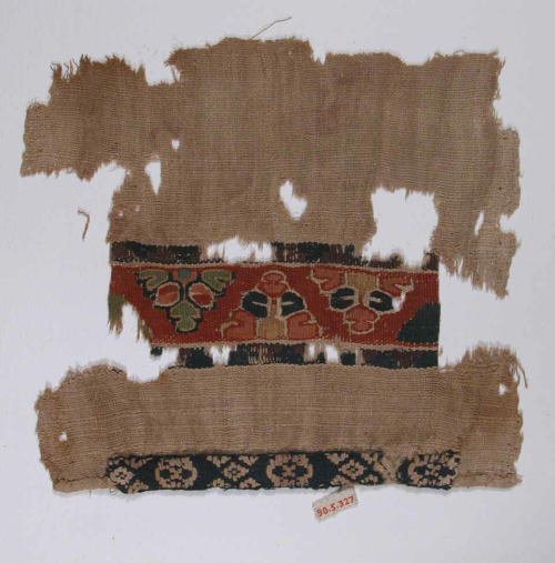Fragment of a Tunic, Metropolitan Museum of Art: Islamic ArtGift of George F. Baker, 1890Metropolita