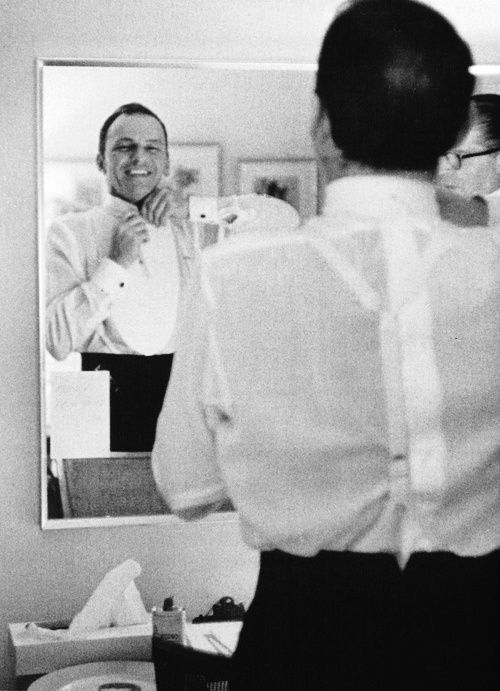 foreverfranksinatra:  Frank flashes a smile backstage. 