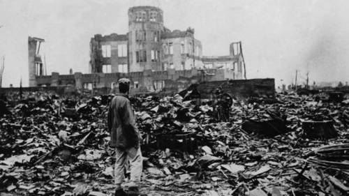historicaltimes:A man views the destruction around the Hiroshima Prefectural Industrial Promotion Ha