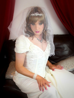 thetransgenderbride:  Here’s another beautiful pose by British TV bride Becki. The blusher over the bride’s face adds romantic mystery to her special day. 