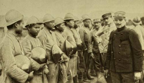 scrapironflotilla:Annamese (modern Vietnam) troops receving new steel helmets, 1916.