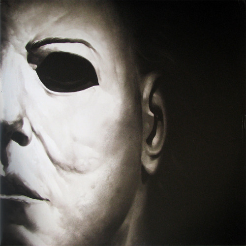 stevesrecords:  John Carpenter ‎– Halloween  Mondo, 2013  **Edition of 1,000 copies with alternate artwork on orange translucent vinyl with black splatter. See the original artwork here.