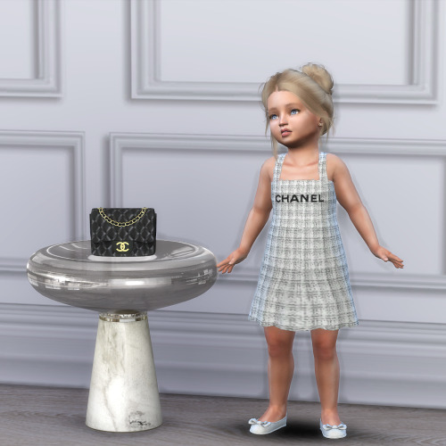  Toddlers Chanel Tweed Dress• 6 Swatches; black & white tweed, with ‘Chanel’ Logo,