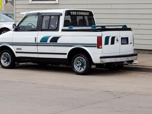 Continuing my recent love of conversion vehicles, here is an Astro van converted to a short bed. May