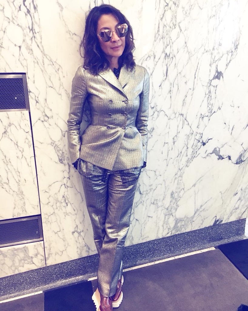 Kick at the darkness until it bleeds daylight : Michelle Yeoh wearing suits  for no reason other...